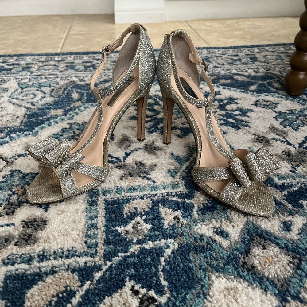 Silver sparkly INC heels with bow detail